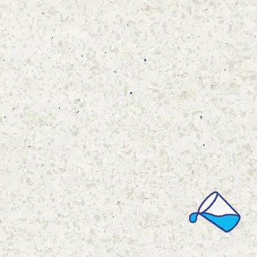 The name of this aquaBRIGHT color swatch is "California White". It's a sample of a light-colored pool finish. The surface is composed of a dense mix of tiny, irregularly shaped white, and tan specks, giving it a speckled, granite-like appearance.